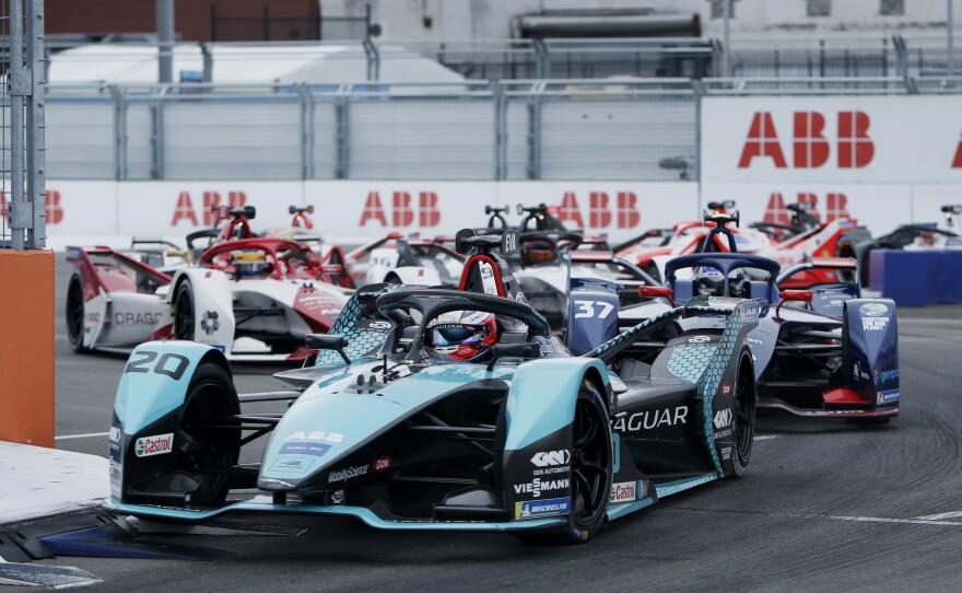 Major automakers like Jaguar develop all-electric race cars to compete in Formula E. Here Mitch Evans, in a Jaguar, leads rivals during the ABB FIA Formula E Championship in New York City on July 11.