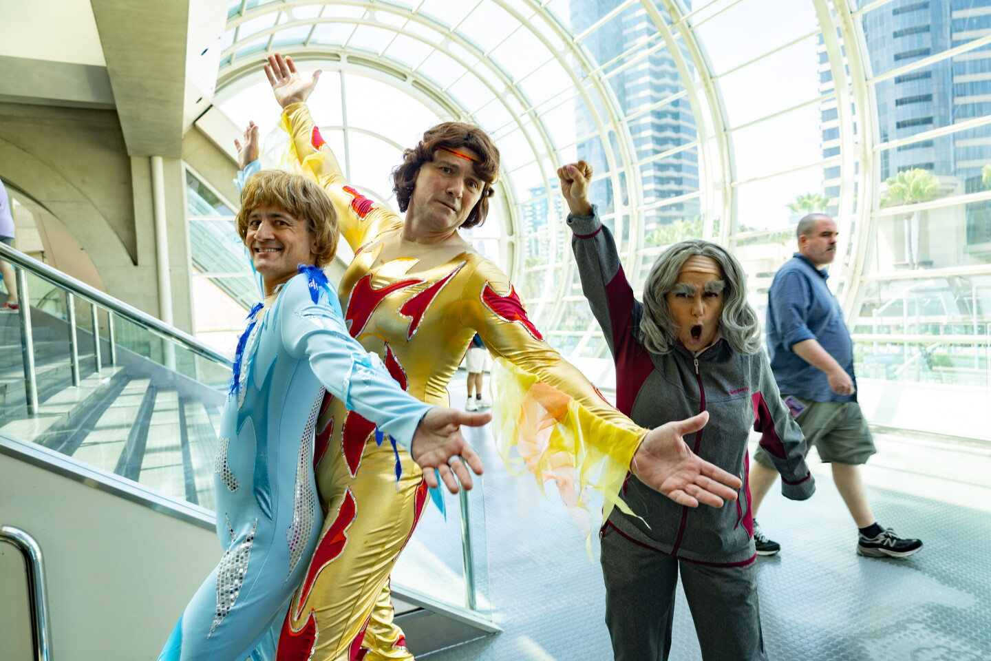Cosplayers dressed as characters from "Blades of Glory" strike a pose at Comic-Con on July 26, 2026.