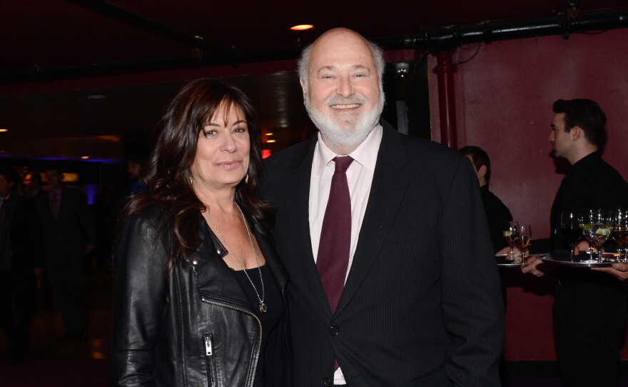 FILE - Actor Rob Reiner and his wife, Michele Singer, arrive for an event on Dec. 17, 2013, in New York.
