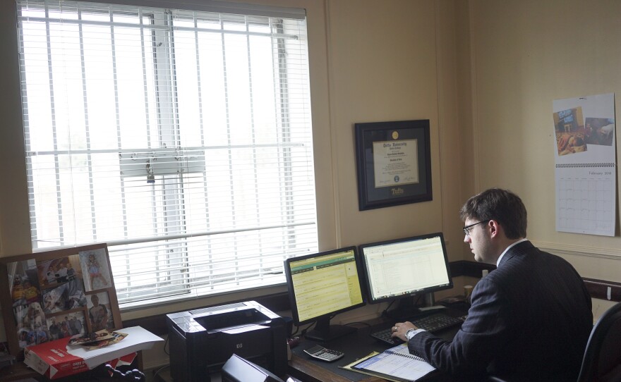 Aaron Sokolow, a Washington, D.C., real estate lawyer, works in his office. Sokolow says some tenants use complaints about poor conditions to justify not paying their rent. He says his clients need rent payments so they can pay their bills and maintain the apartments.