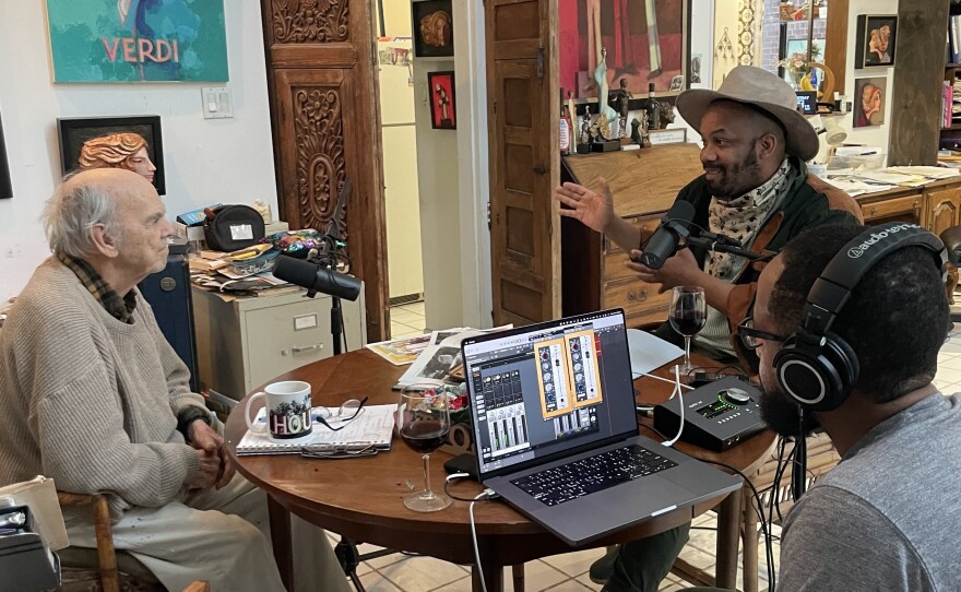 Artist David Addicks, left, speaks with Houston Poet Laureate Outspoken Bean and producer Russell Guess in 2022.