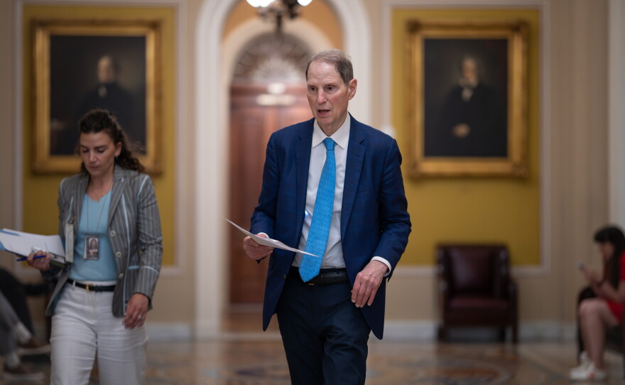 Sen. Ron Wyden, D-Ore., walks to the chamber during votes on the immigration enforcement funding package, at the Capitol in Washington, Thursday, June 4, 2026.