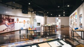The exhibition "Print Culture" at the San Diego Central Library, seen on Dec. 10, 2016, showcases the graphic designs of San Diego artists in the 1950s and '60s, including their work for defense contractors and the military. 