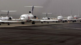 Airplanes line up as they await their turn to take off at Newark International Airport in New Jersey, February, 2008.