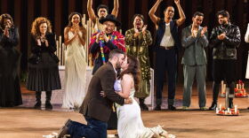 Oscar Diaz and Janelly Mendoza (kneeling), from Laredo, TX, were married on stage on June 11, after a performance of Romeo and Juliet at the Public Theater's Delacorte Theater, (would add: in New York)