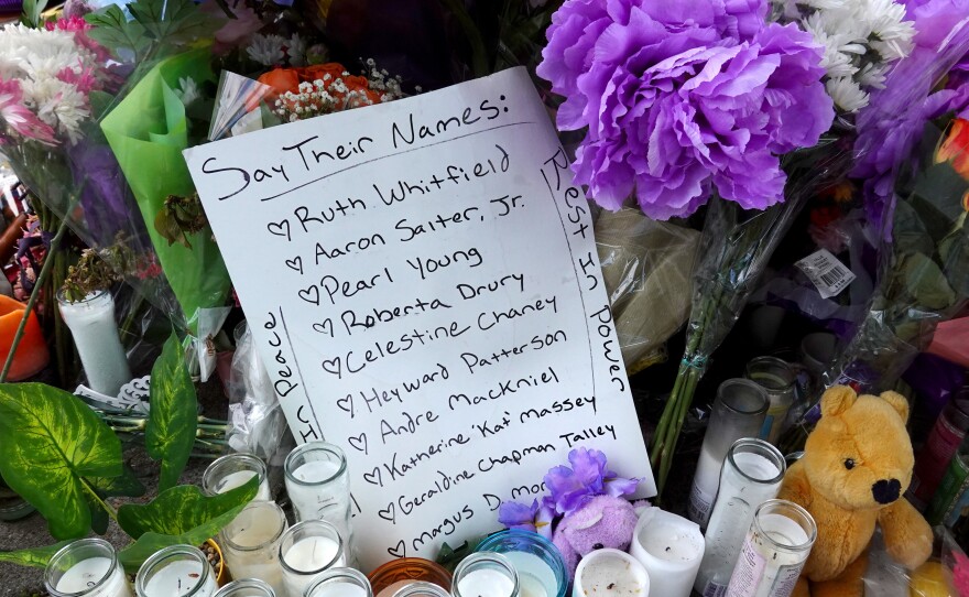 The names of the 10 people killed in Saturday's shooting at Tops market are part of a makeshift memorial across the street from the store on May 17 in Buffalo.