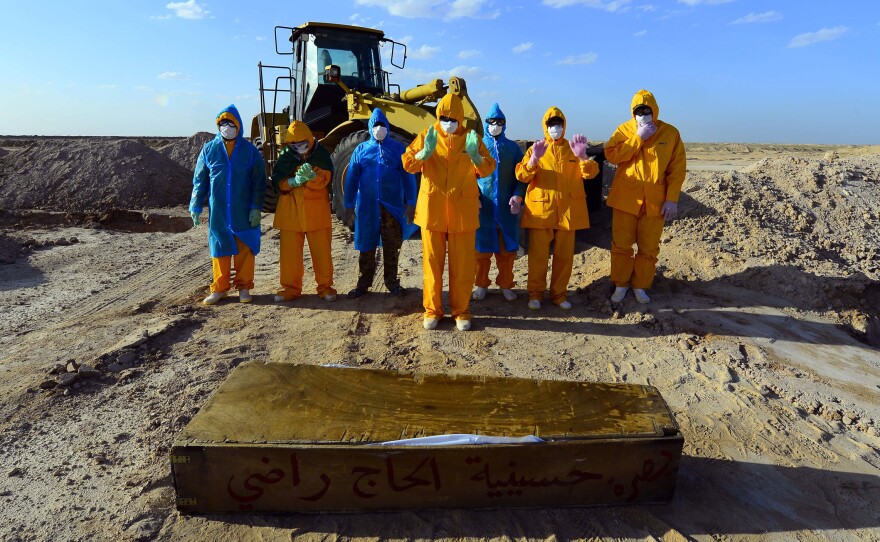 On April 3, Iraqi volunteers in full hazmat gear prayed over the coffin of a 50-year-old who died of COVID-19. She was buried at a cemetery specifically opened for such deaths, some 12 miles from the holy city of Najaf.