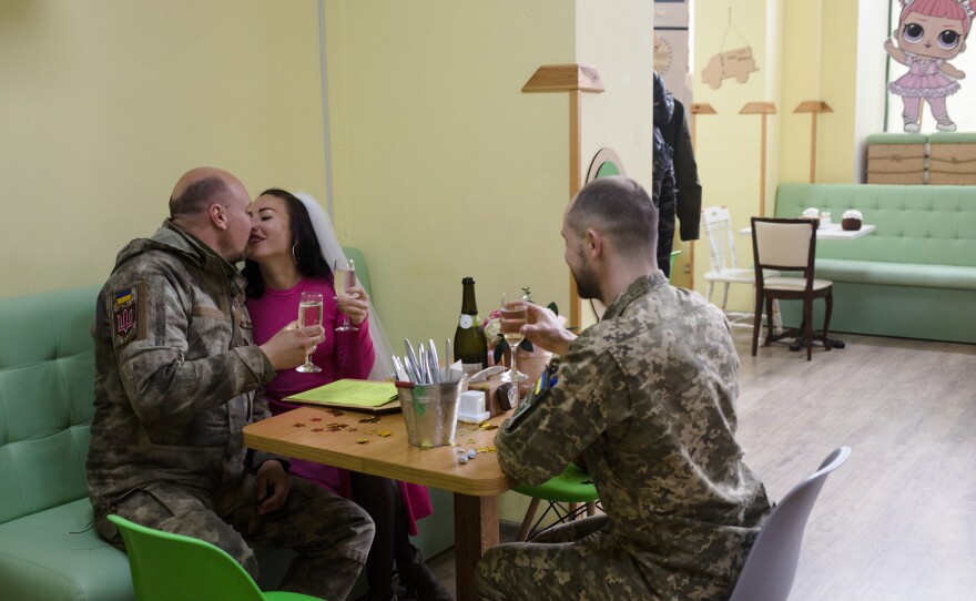 <strong>April 20:</strong> Svitlana and Andriy, a Ukrainian serviceman, celebrate their wedding in one of the few open cafes in Mykolaiv, Ukraine. The couple dated for a few years and planned a wedding in Kyiv, where they're both from, but had to change plans due to the war.