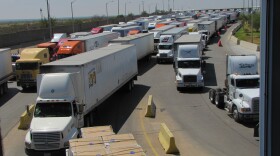 Trucks line up for for inspection at the World Trade Bridge in Laredo, Texas. About 5,000 trucks per day travel through this commercial crossing. 