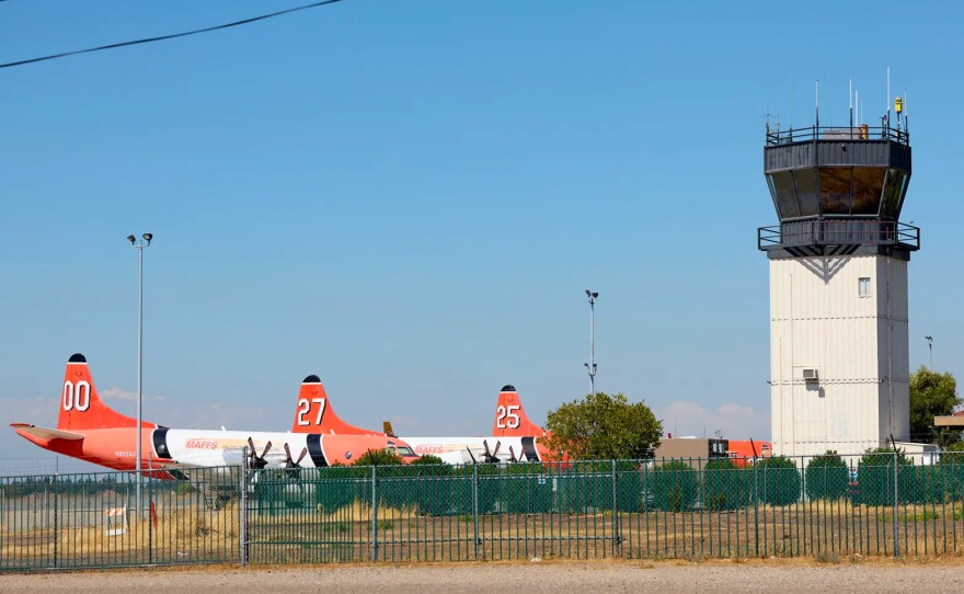 Airplanes and the control tower of the Chico Regional Airport in Chico on Sept. 6, 2023.