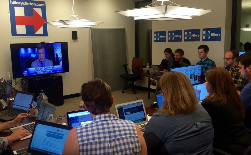 The Clinton Campaign debate watch war room was actually just a conference room with a big screen TV at the front. Fifteen or so staffers huddled over their laptops ready to pounce.