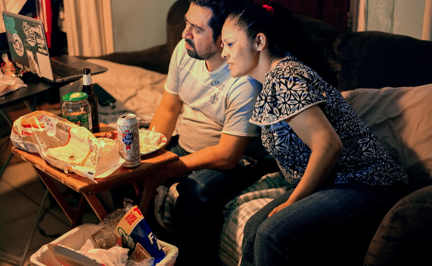 Nelly and Mario Villanueva watch telenovelas together in 2018.