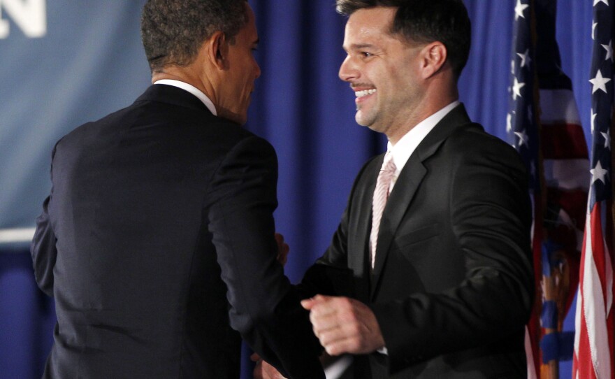 President Obama is introduced by singer Ricky Martin at a fundraiser hosted by Martin and the LGBT Leadership Council at the Rubin Museum of Art on May 14 in New York.