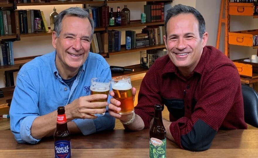 Jim Koch (left) and Sam Calagione with their flagship beers.