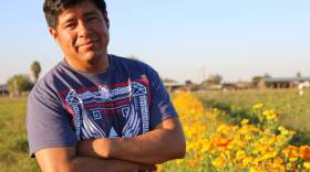 Antionio Chavez, who leases a 7-acre farm from a family friend to grow what he grew in Oaxaca: squash, chilies and marigolds, posed for a photo in this undated photo. 