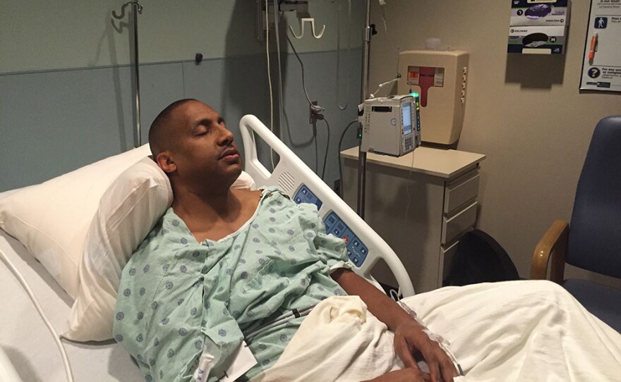 Claude Motley in hospital before surgery, after getting shot. 