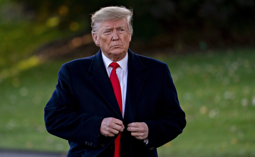 President Donald Trump speaks to the media before boarding Marine One on the South Lawn of the White House. He's expected to spend the weekend in New York and take in a UFC fight.