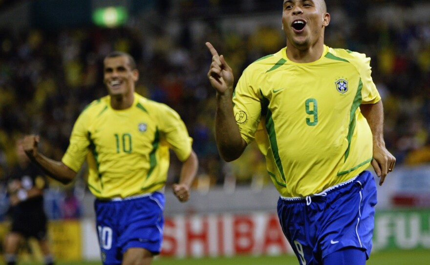 Ronaldo of Brazil celebrates scoring the winning goal during the FIFA World Cup 2002 semi-final match against Turkey played at the Saitama Stadium in Japan on June 26, 2002. Brazil won the match 1-0.