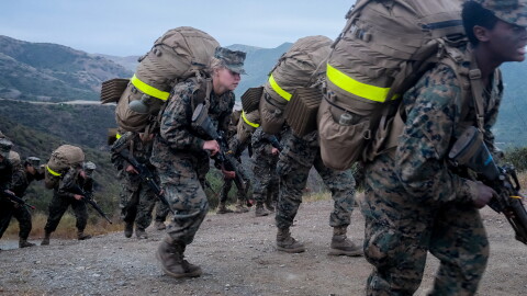 Marine recruits summiting the Reaper, the highest point in Camp Pendleton, and the last obstacle in their three-day, 54-hour Crucible, their last test before becoming Marines, April 22, 2021.