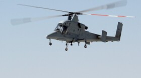 A K-MAX helicopter lands at Camp Bastion, Afghanistan in October 2012.