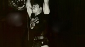 Tommy Kono lifting during a competition. (undated photo)
