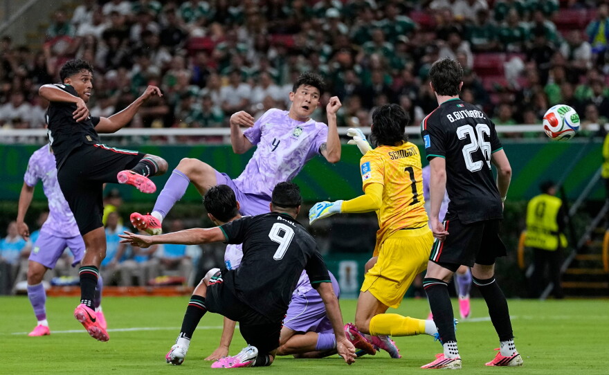 Mexico's Luis Romo (7), left, scores the opening goal during the World Cup Group A soccer match between Mexico and South Korea in Zapopan, near Guadalajara, Mexico, Thursday, June 18, 2026.