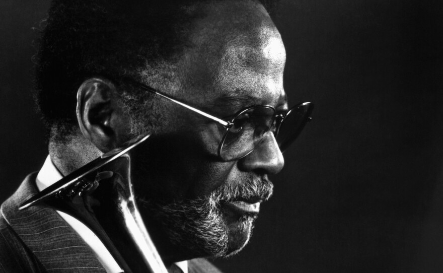 Trumpeter Clark Terry posing in 1991. Terry's wife announced Saturday that he had died at age 94.