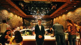 The doorman at Starlite, a restaurant and bar on India Street. Starlite was designed by Bells & Whistles, a local interior design and build firm.  
