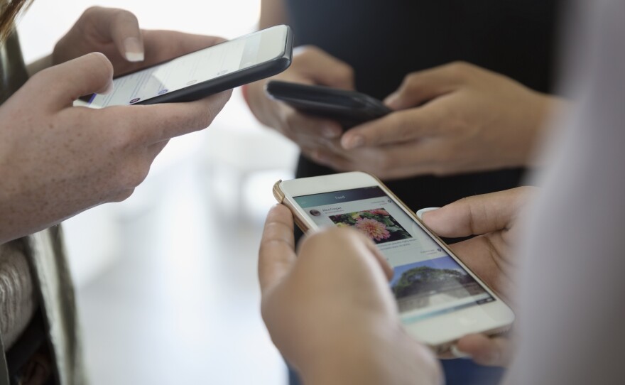 Phone users on social media.