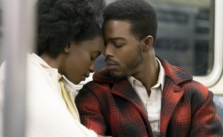 Tish (KiKi Layne) and Fonny (Stephan James) enjoy a quiet moment in Barry Jenkins adaptation of James Baldwin's "If Beale Street Could Talk."