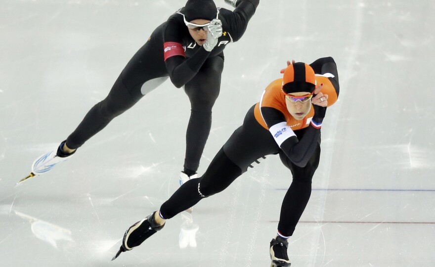 Brittany Bowe of the United States (left) trails behind Ireen Wust of the Netherlands in the women's 1,000-meter speedskating race in Sochi, Russia, in 2014. The U.S. team won no medals at Sochi.