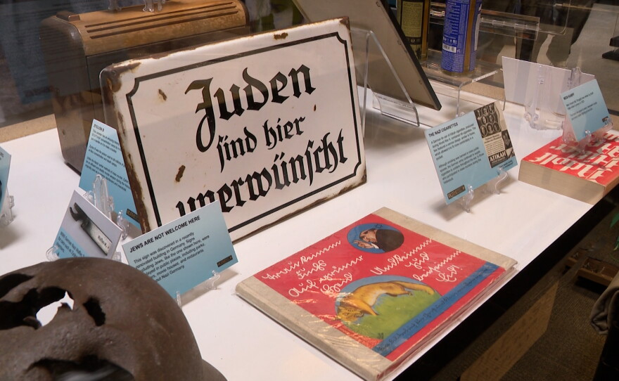 A sign from a store in Nazi Germany is shown with words in German that mean "Jews are not wanted here" at the RUTH exhibit in the Central Library on Sept. 8, 2026.