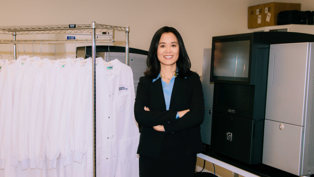 CEO Molly He of Element Biosciences stands beside the company's AVITI gene and cellular scanning device.  July 28, 2025