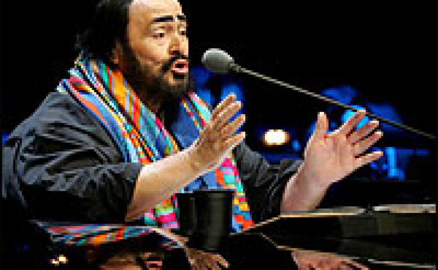 Pavarotti in concert on his farewell tour in Beijing in 2005.