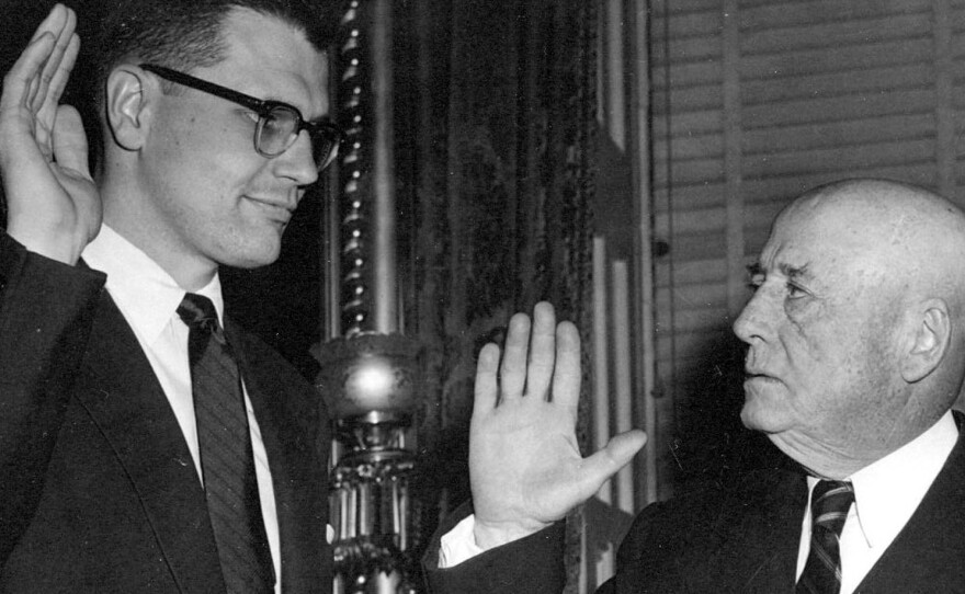 Rep. John Dingell is sworn in by mentor and Speaker of the House Sam Rayburn of Texas in 1955. Dingell decided not to run for re-election this year and described himself and Rep. Ralph Hall, also leaving Congress when his term expires, as the last leaves on the tree.