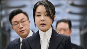 FILE - South Korea's former first lady Kim Keon Hee, wife of impeached former president Yoon Suk Yeol, arrives at a court to attend a hearing to review her arrest warrant requested by special prosecutors, in Seoul, South Korea, on Aug. 12, 2025.