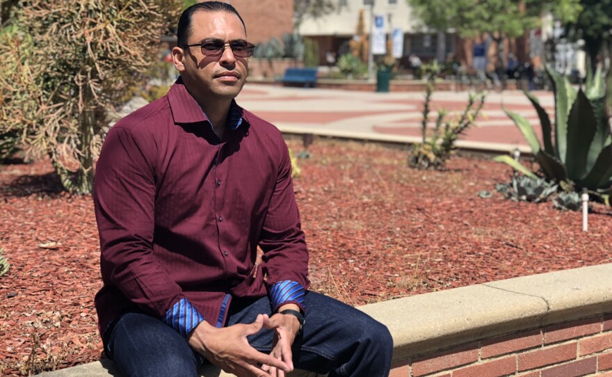 John Schimmel sits on the campus of Los Angeles City College, April 18, 2018.