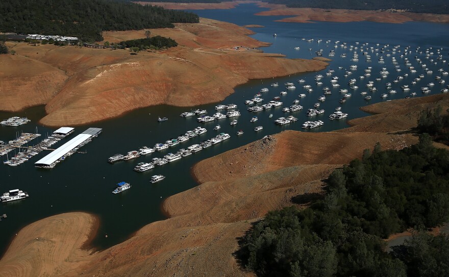 Low water levels are visible in the Bidwell Marina at Lake Oroville in August 2014.