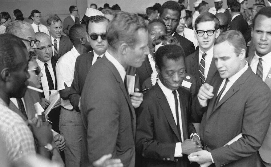Civil Rights March on Washington, D.C. Author James Baldwin with actors Marlon Brando and Charlton Heston. Aug. 28,1963.
