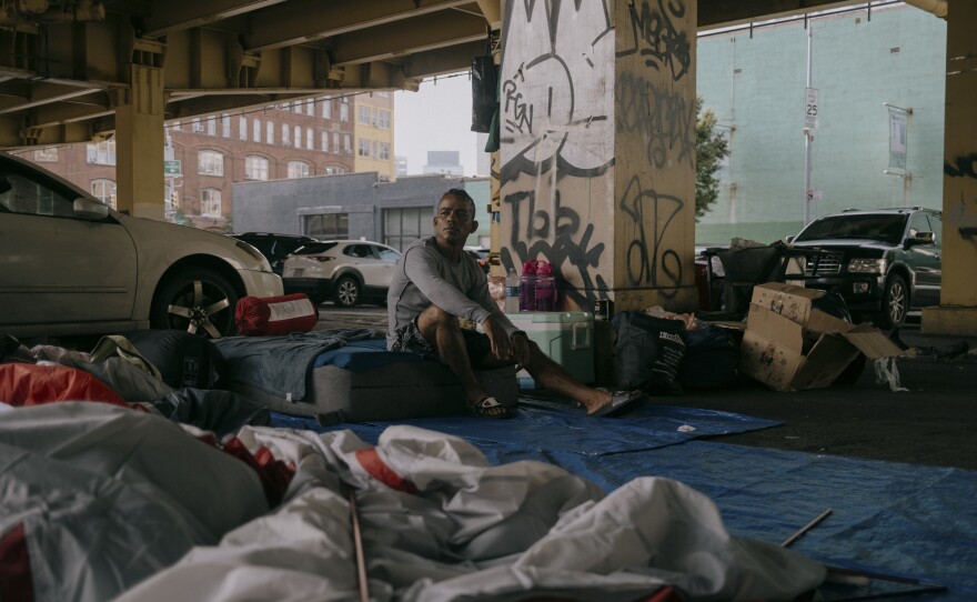 Jose Alvarado, an asylum-seeker who arrived in New York City from Venezuela, sits at his camp. Alvarado says he was expelled from the Clinton Hill shelter due to an incident in the facility bathrooms. Brooklyn, New York, on July 19, 2023.