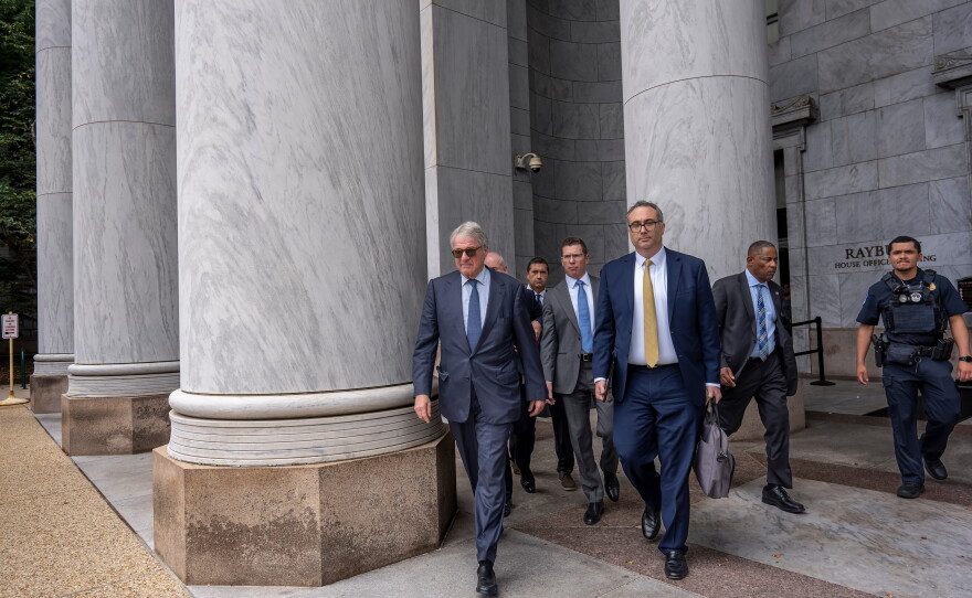 Leon Black, left, a billionaire who was close with Jeffrey Epstein, walks out of the Rayburn House Office Building at the Capitol after his interview about Epstein with the House Oversight Committee, in Washington, Friday, June 26, 2026.