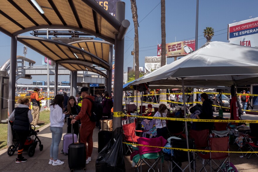 Hundreds of Ukrainian war refugees camp out at this Tijuana bus stop near the San Ysidro Port of Entry while they wait in line for the chance to claim asylum in the United States, April 4, 2022.