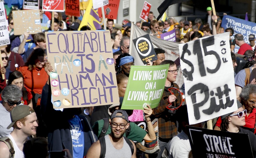 Union organizers, students and supporters for a $15 an hour wage march in Pittsburgh in April. Washington, D.C., is the latest city to move toward the wage increase.