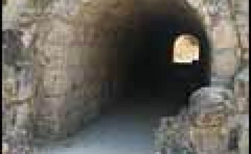 Athletes entered the stadium of Nemea through this tunnel dug through the embankment. Graffiti etched into the stone by ancient athletes can still be read on the walls.