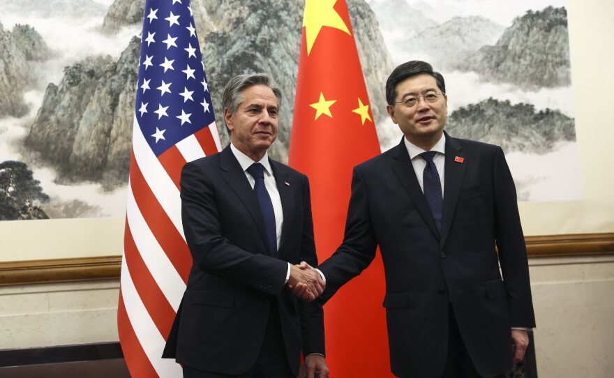 U.S. Secretary of State Antony Blinken, left, shakes hands with Chinese Foreign Minister Qin Gang, right, at the Diaoyutai State Guesthouse in Beijing, China, Sunday, June 18, 2023.