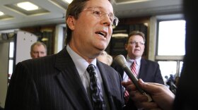 James E. Lentz, head of Toyota Motor Sales USA, talks to the media before testifying at Tuesday's House Oversight and Investigations Subcommittee hearing.