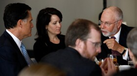 Paul Singer (right) speaks with Mitt Romney during a forum of the Foreign Policy Initiative in Washington in 2009. Hedge fund manager Singer of Elliott Management has donated $1 million to Mitt Romney's superPAC.