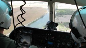 Texas Department of Public Safety pilots monitor the Rio Grande River near Los Ebanos, Texas.