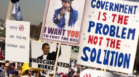 Protesters hold up a placards calling for Congress to kill the Health Care Reform bill during a demonstration on Capitol Hill on March 20, 2010, in Washington, DC.