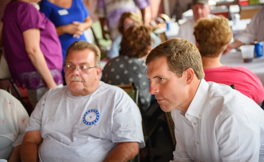 Rep. Conor Lamb, D-Pa., talks with constituents at Riardo's Bar and Grill in New Castle, Pa., last summer.